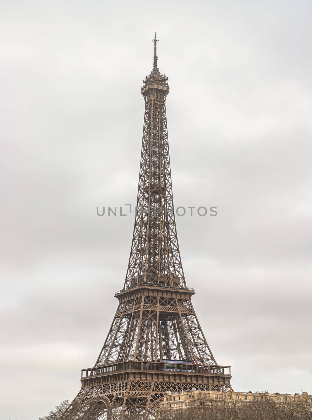 France, Paris - Jan 4, 2024 - Nice scenery of Eiffel Tower and Seine River in Paris at Afternoon. Destinations in Europe. Space for text, Selective focus.