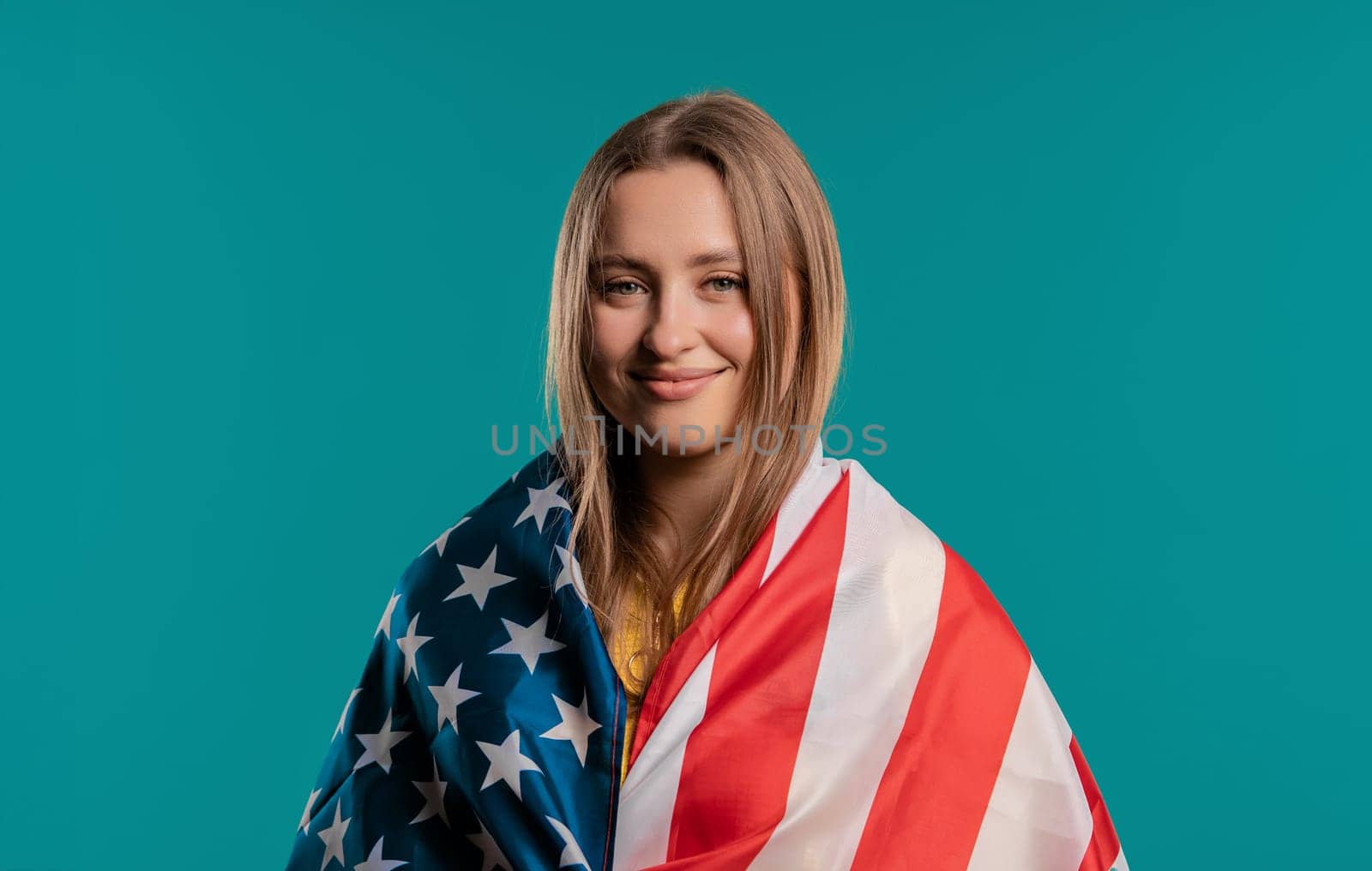 Happy woman with national USA flag on blue. American patriot 4th of July by kristina_kokhanova