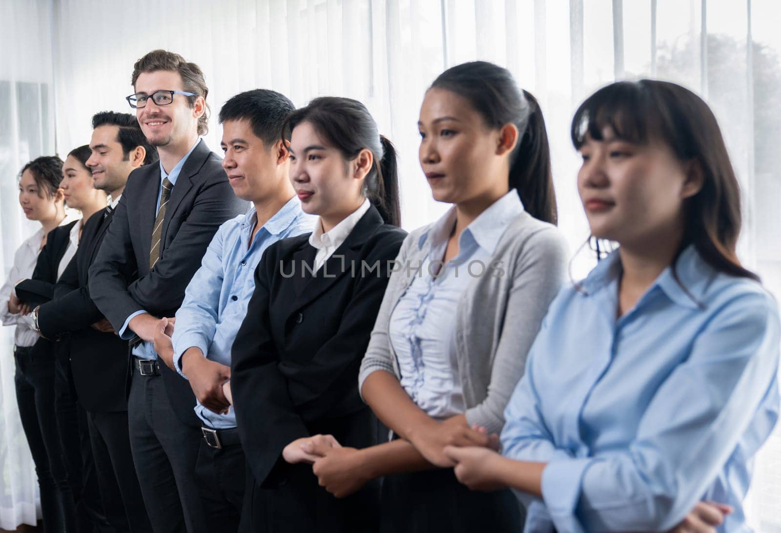 Modern diversity and multicultural company, business people joining hand together and standing in line, shared commitment to collaboration and cooperation concept background. Meticulous