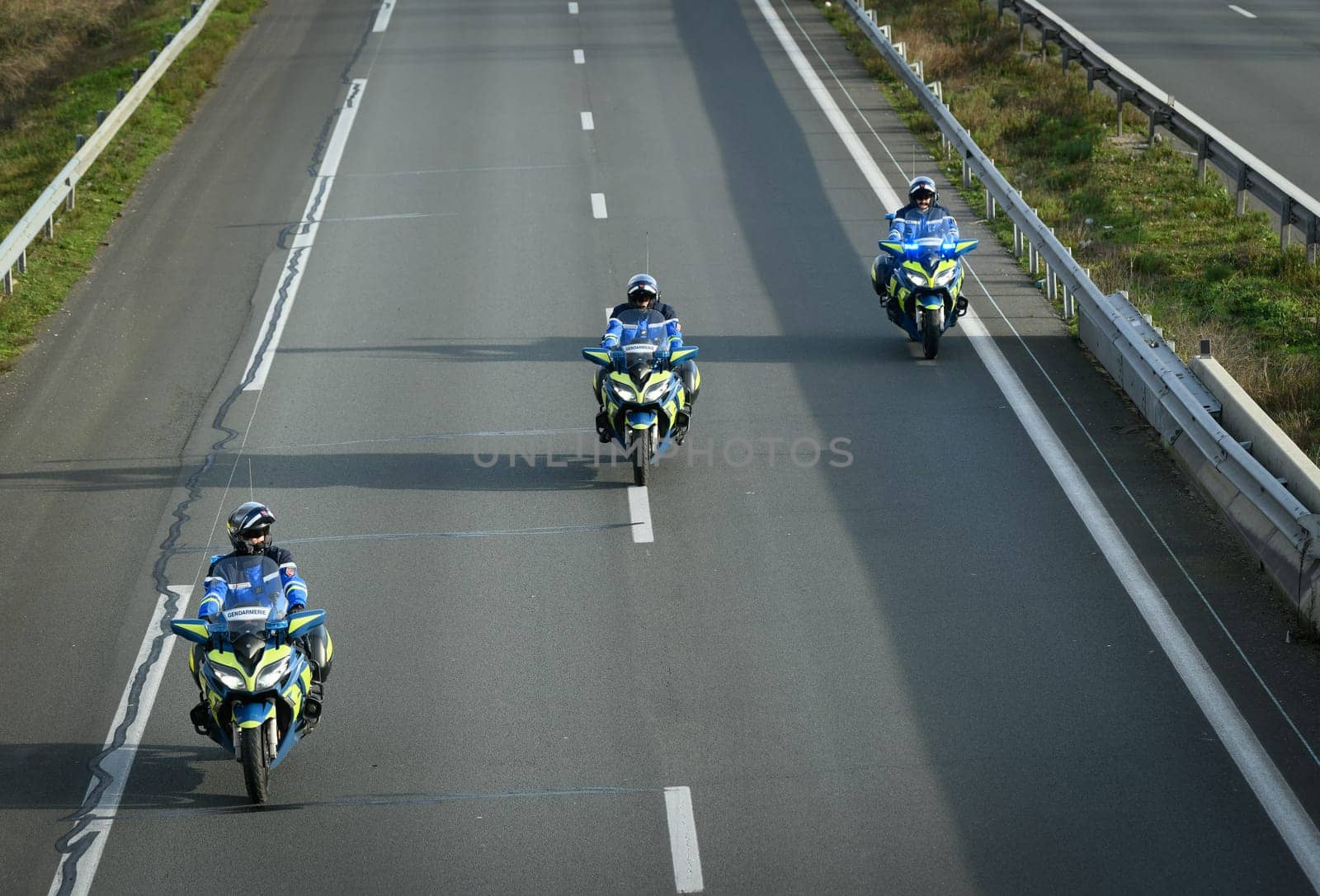 France, Bordeaux, 29 January 2024, Farmers' demonstration, mobile gendarmes on their motorbikes securing a demonstration by French farmers on a motorway in south-west France. High quality 4k footage