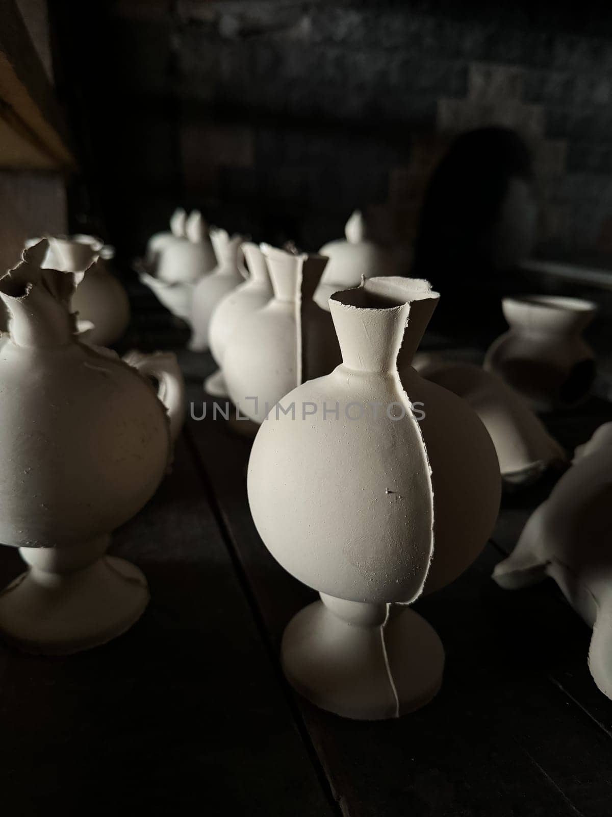 Clay blanks for a kerosene lamp in a pottery workshop. Close up photo. High quality photo
