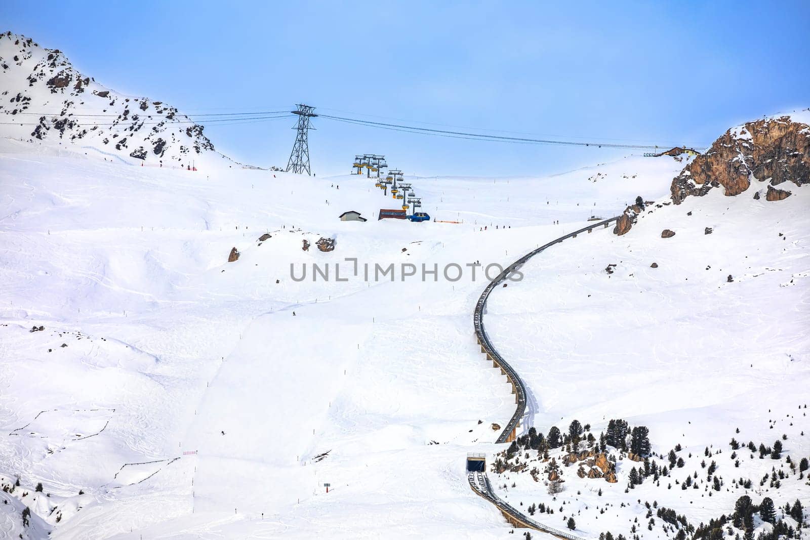 Town of Sankt Moritz luxury winter ski slope and cogwheel track view, Graubunden region of Switzerland