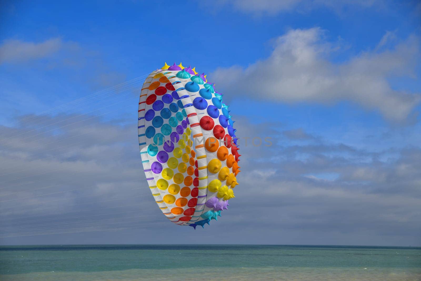 Multicolored air kite at the Atlantic ocean