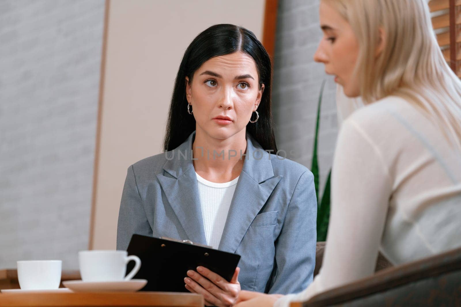 Psychological consultation on mental health or seeking help from professional, young patient on therapy session while psychiatrist making diagnostic on mental illness. Mental treatment session. Blithe