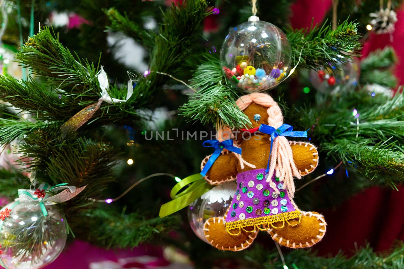 A handmade Christmas tree decoration hangs on the Christmas tree by Serhii_Voroshchuk