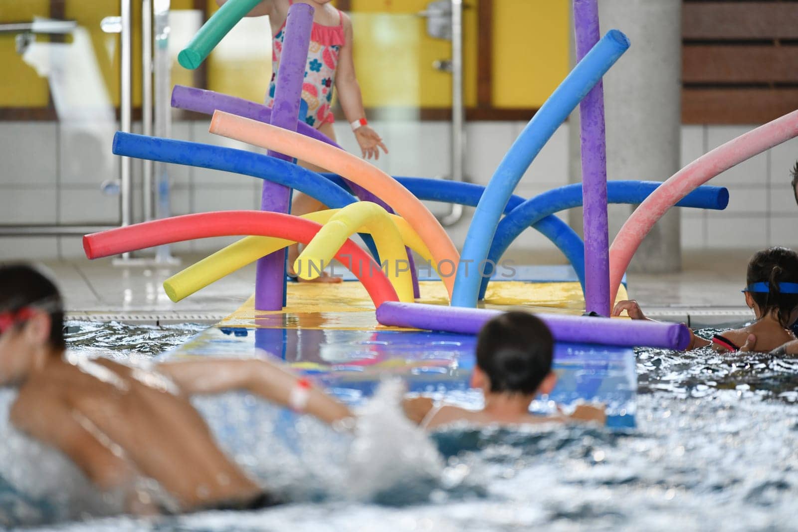 Colorful wacky Noodles in swimming Pool Toys Foam Stick, Swimming Pool Noodles.