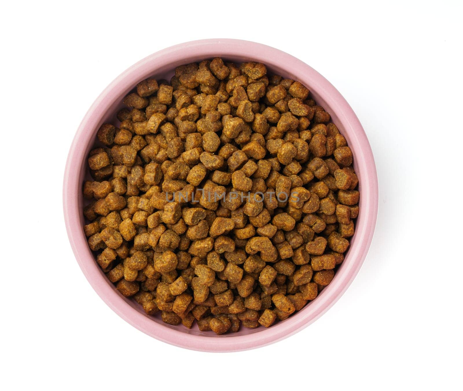 Bowl with dry pet food isolated on white background close up