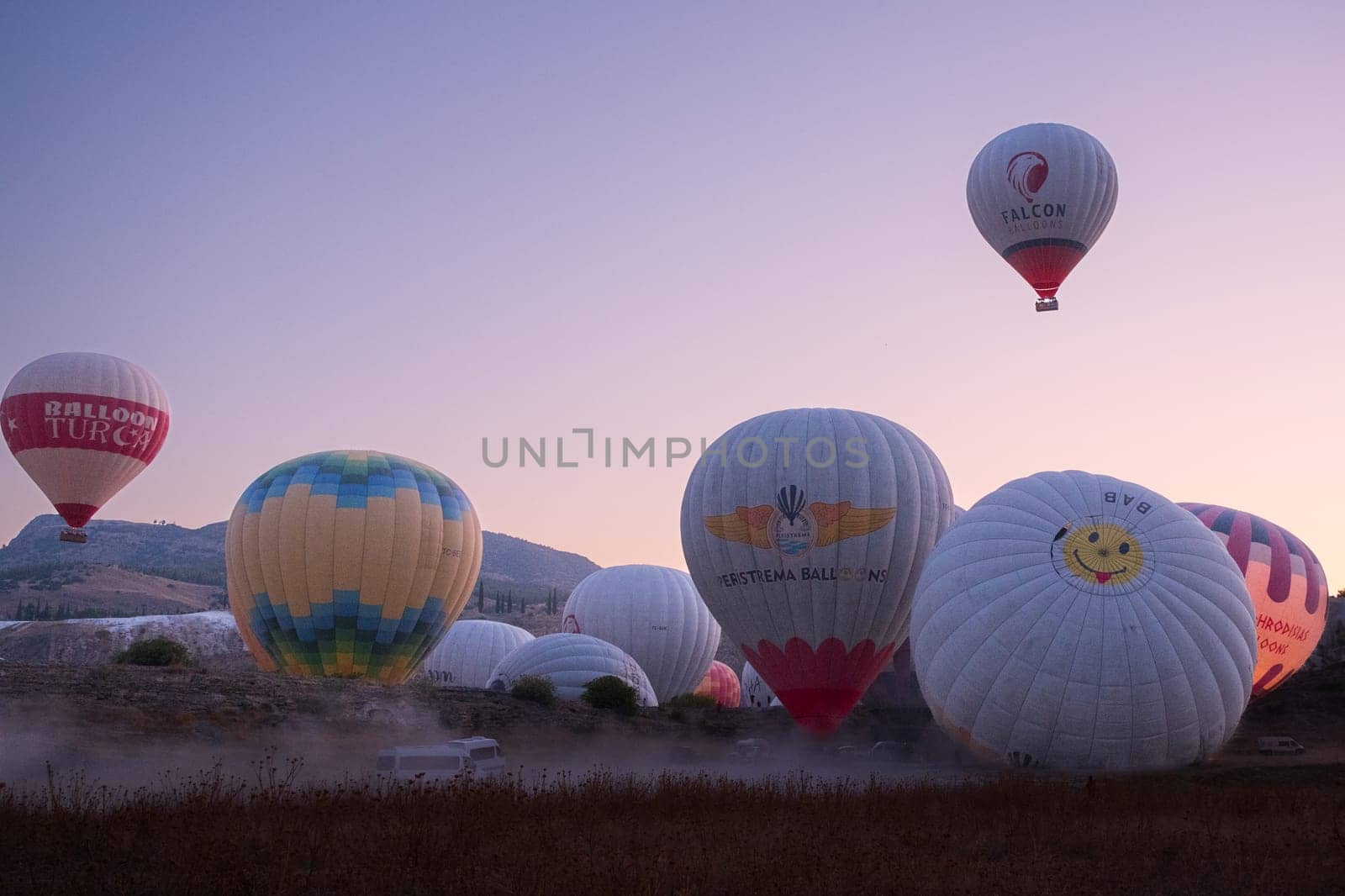Pamukkale,Denizli,Turkey - October 15, 2023, hot air balloons flying over Pamukkale by senkaya