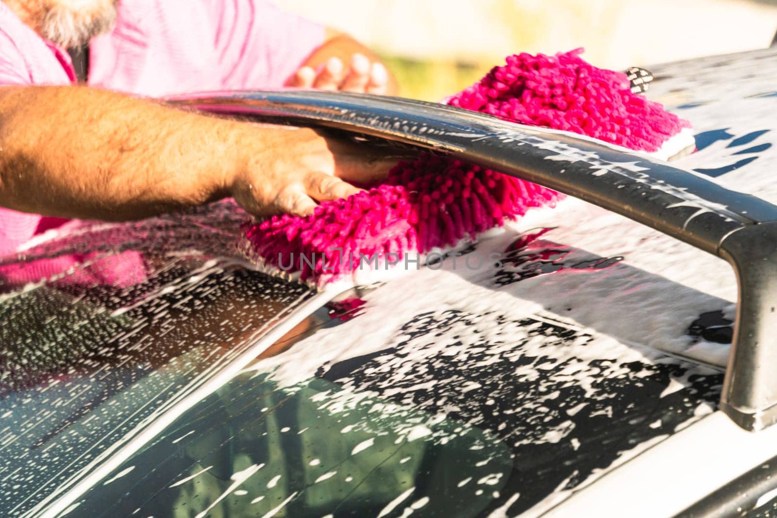 Eco-Friendly Cleaning: Washing an Electric Car at Home by arinahabich