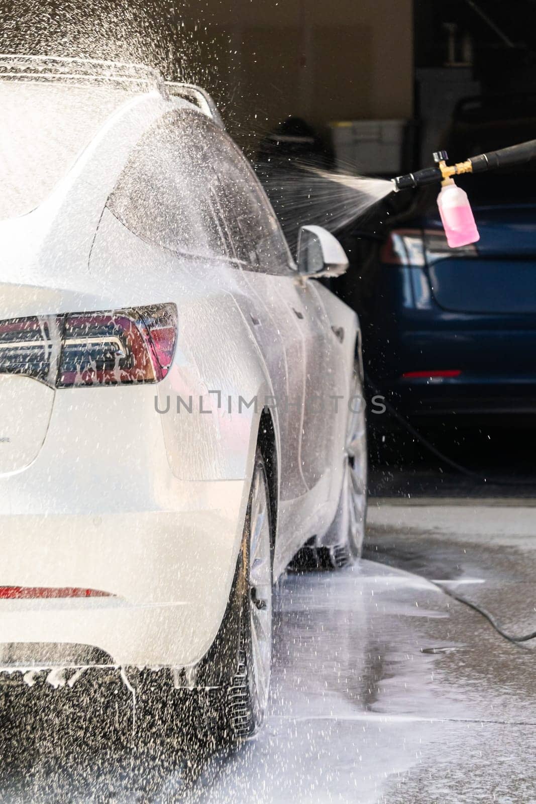 Eco-Friendly Cleaning: Washing an Electric Car at Home by arinahabich