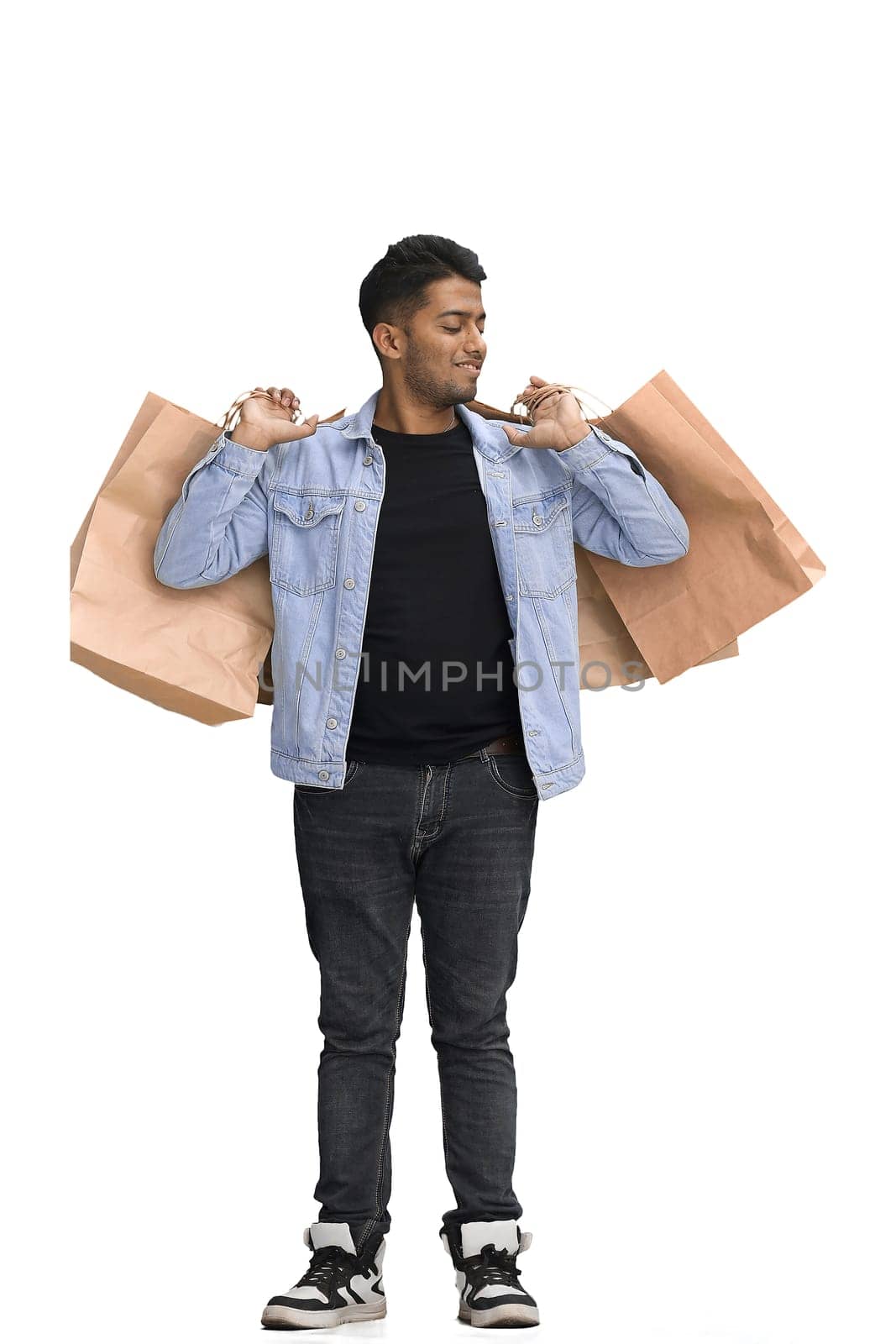Man on a white background with shoppers by Prosto