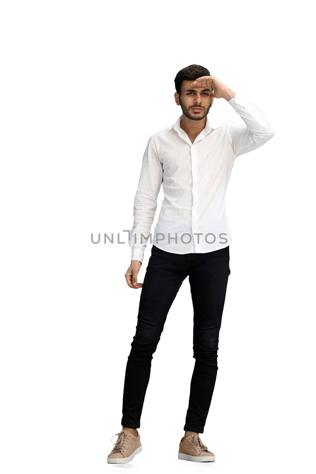 a man on a white background look far.