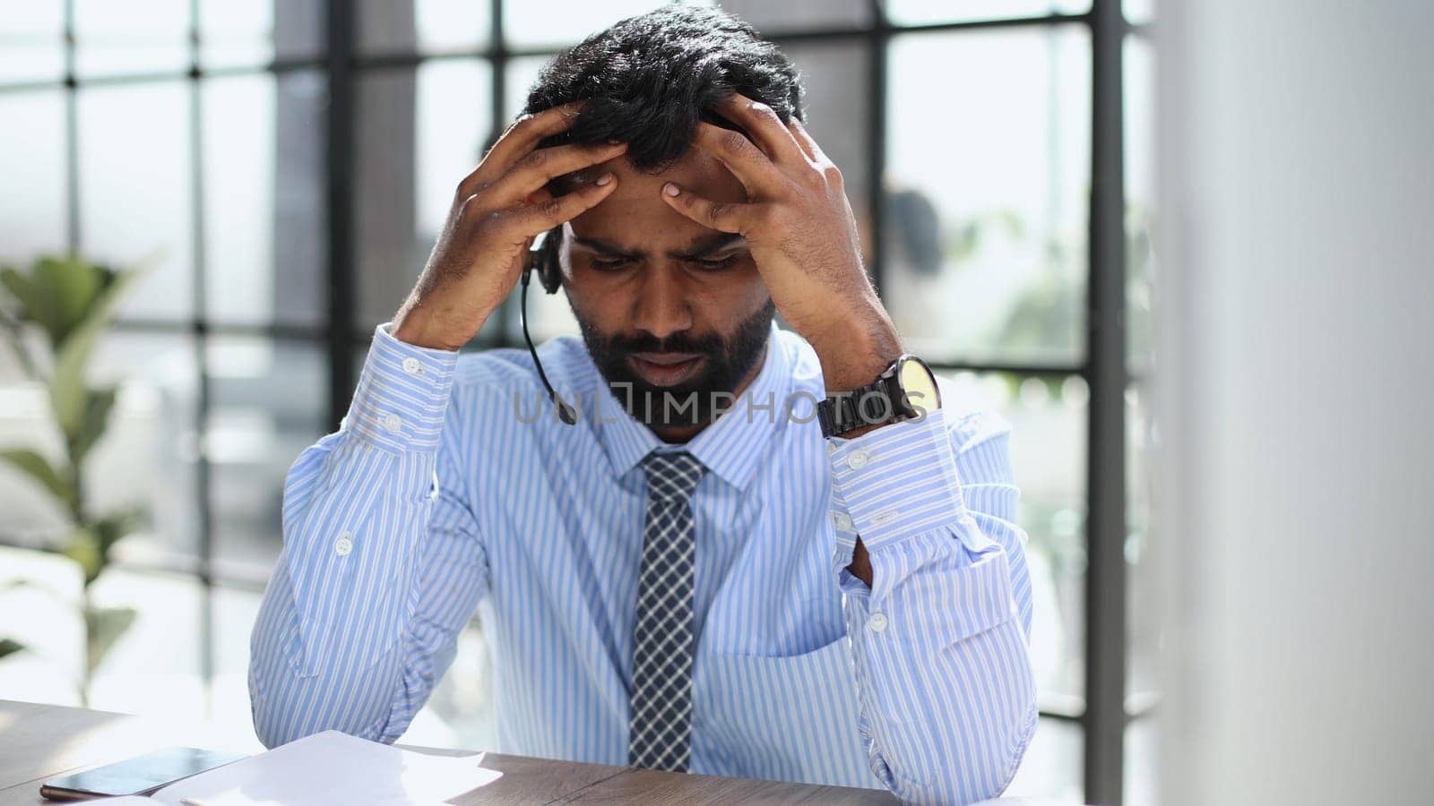 Upset angry shocked businessman, broker or ceo, working in office