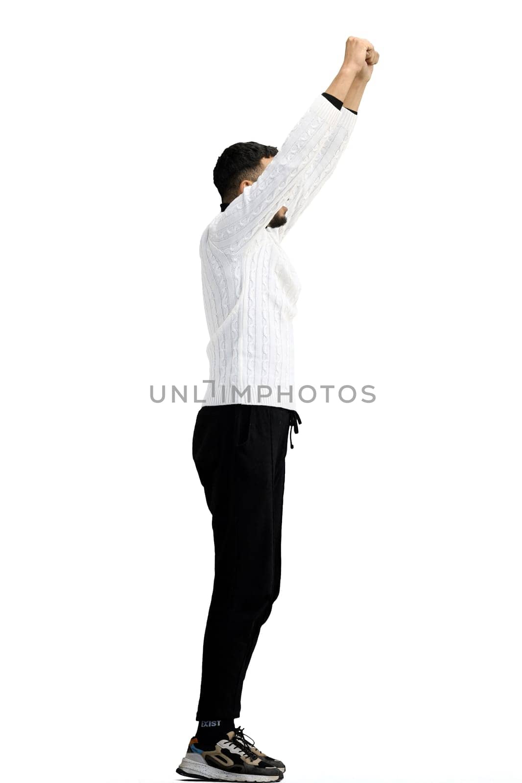 A man, full-length, on a white background, raised his hands up by Prosto