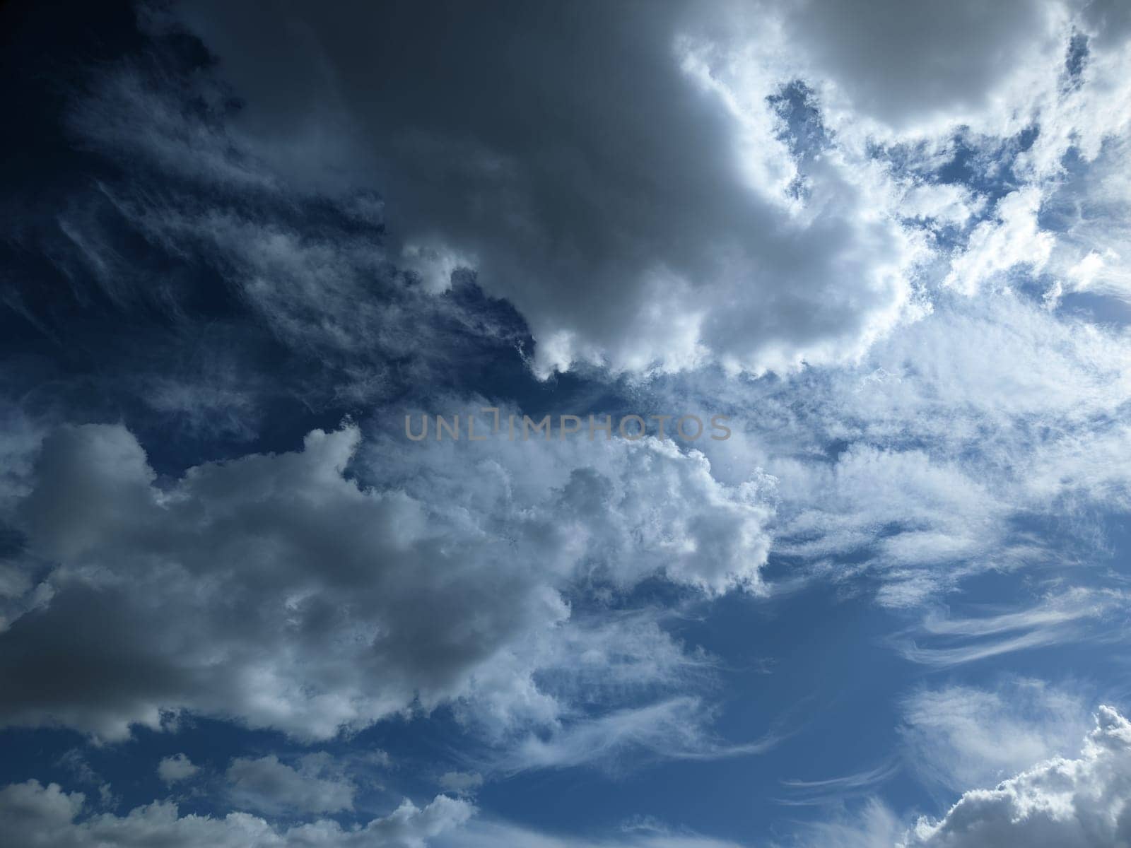 white clouds over blue sky background by z1b