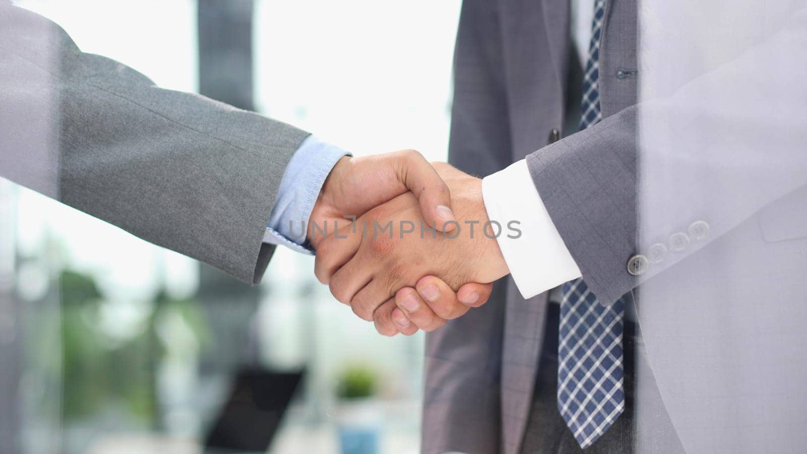Close up of handshake in the office