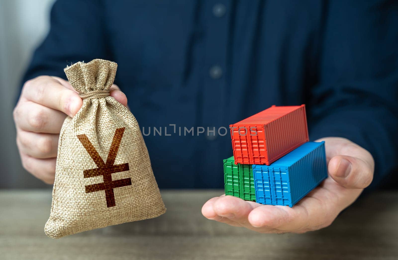 Shipping containers and chinese yuan or japanese yen money bag. Economic growth, production and development of transport infrastructure. Make a trade deal. Import and export. Profit from sale of goods