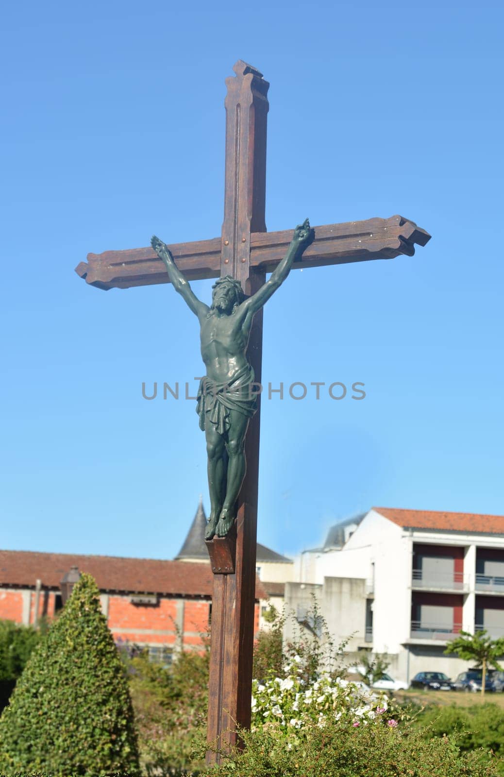 A clay carved statue of the Crucifixion of Jesus by Godi