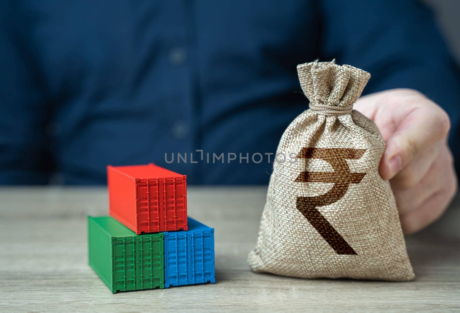 Shipping containers and indian rupee money bag. Economic growth, increased production and development of transport infrastructure. Profit from sales of goods. Make a trade deal. Import and export. by iLixe48