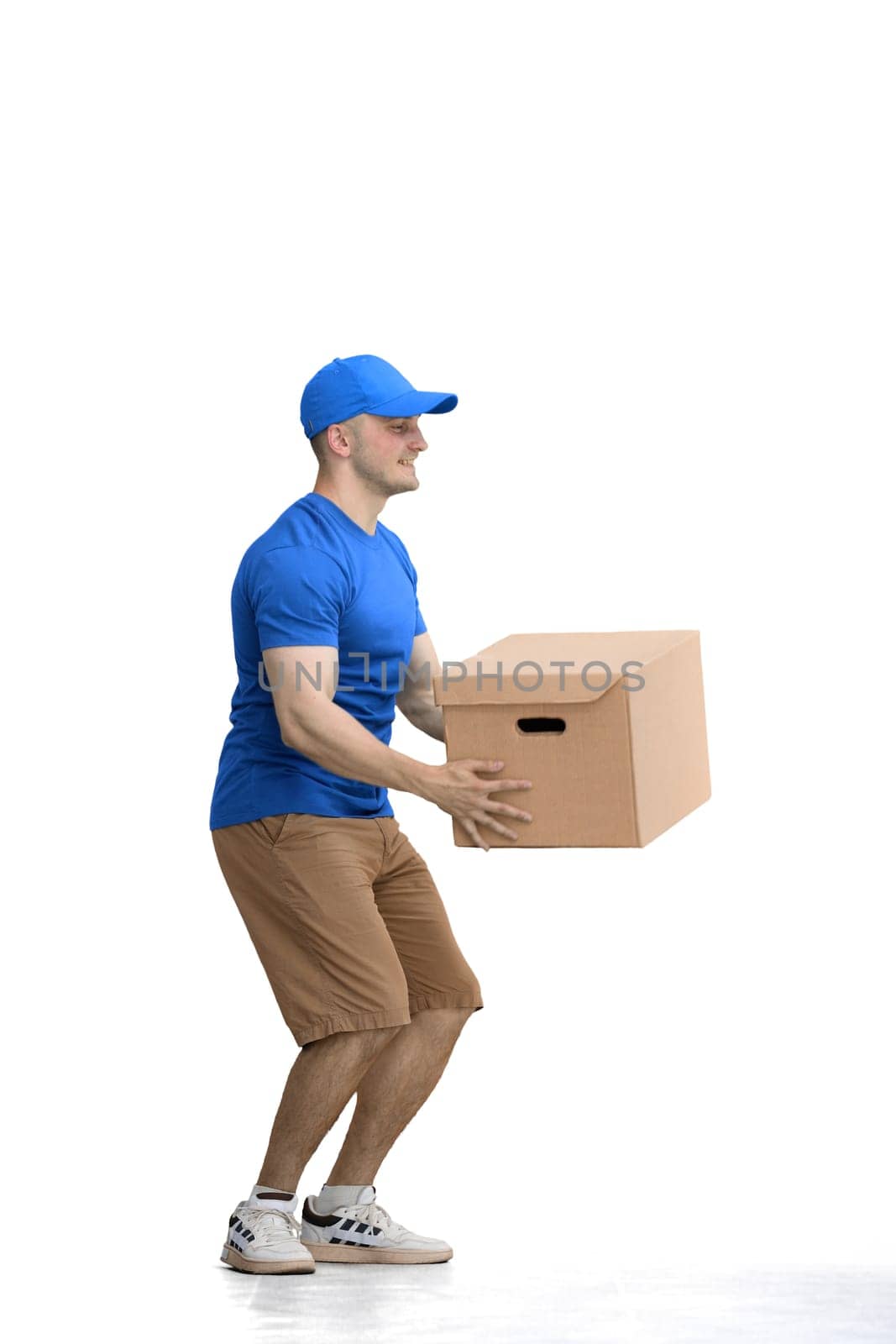A male deliveryman, on a white background, full-length, with a box by Prosto