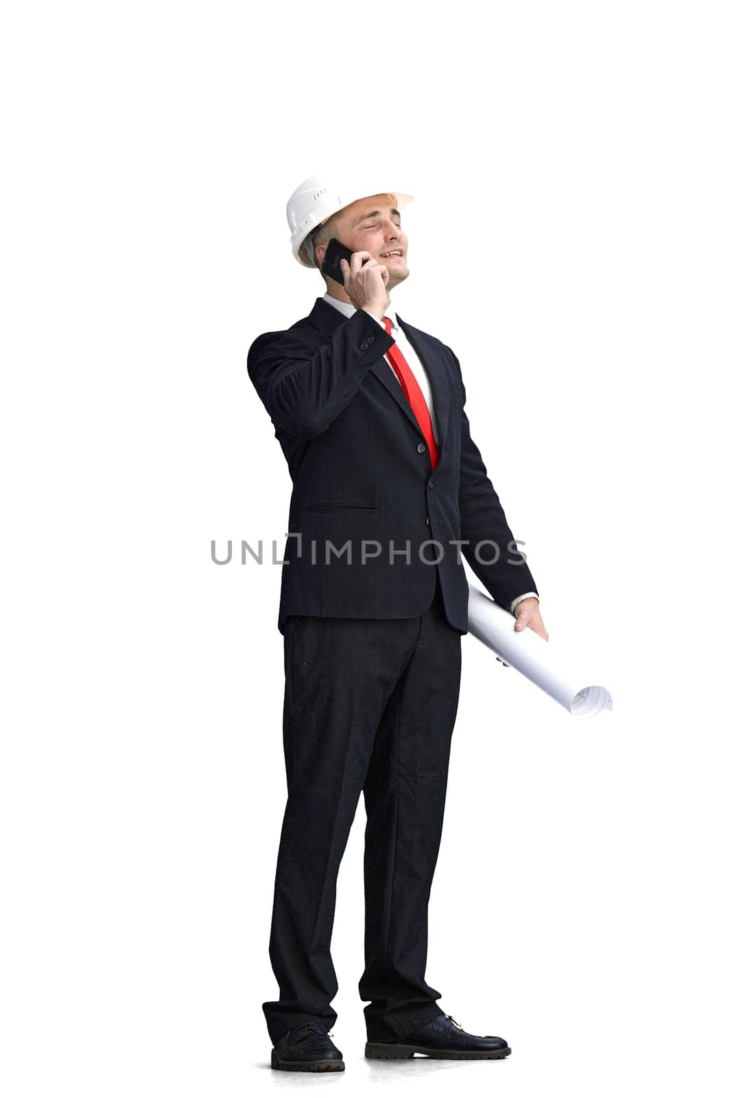 Foreman, on a white background, full-length, with a drawing and a phone.