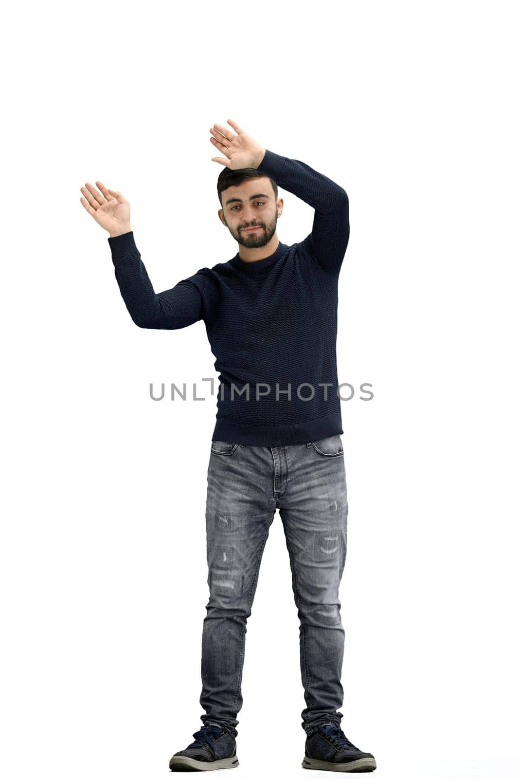 A man, full-length, on a white background, waving his arms.