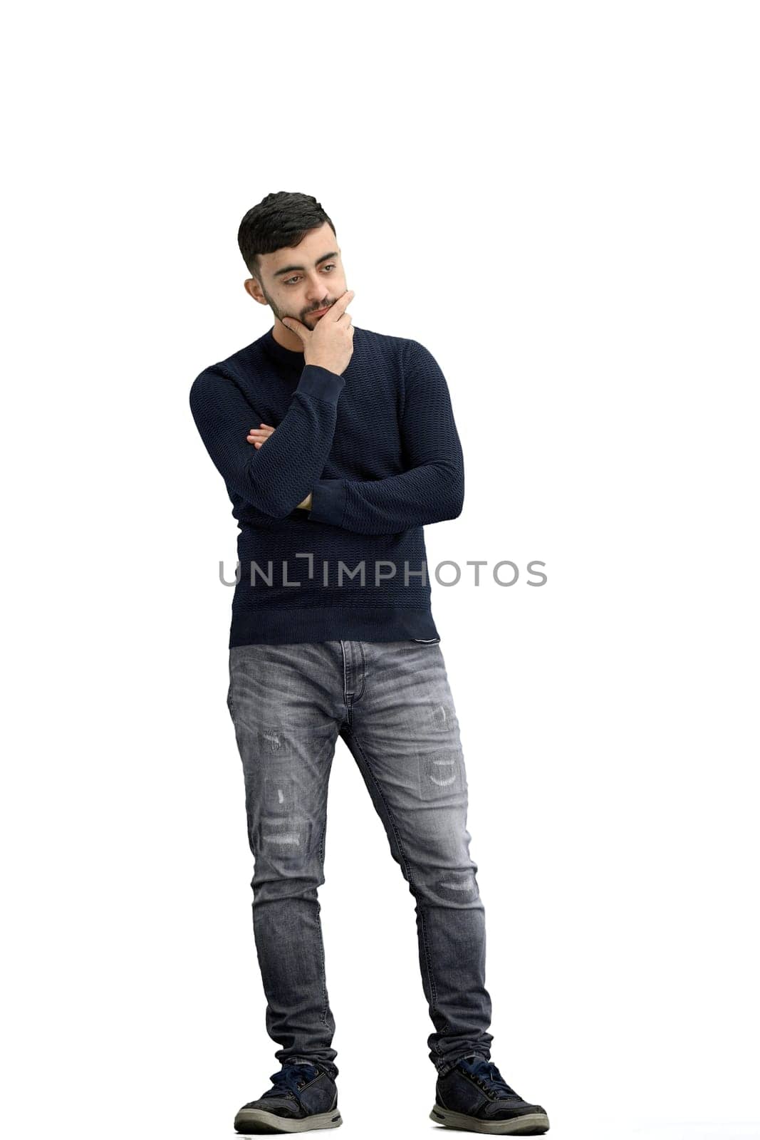 A man, full-length, on a white background, thinks.