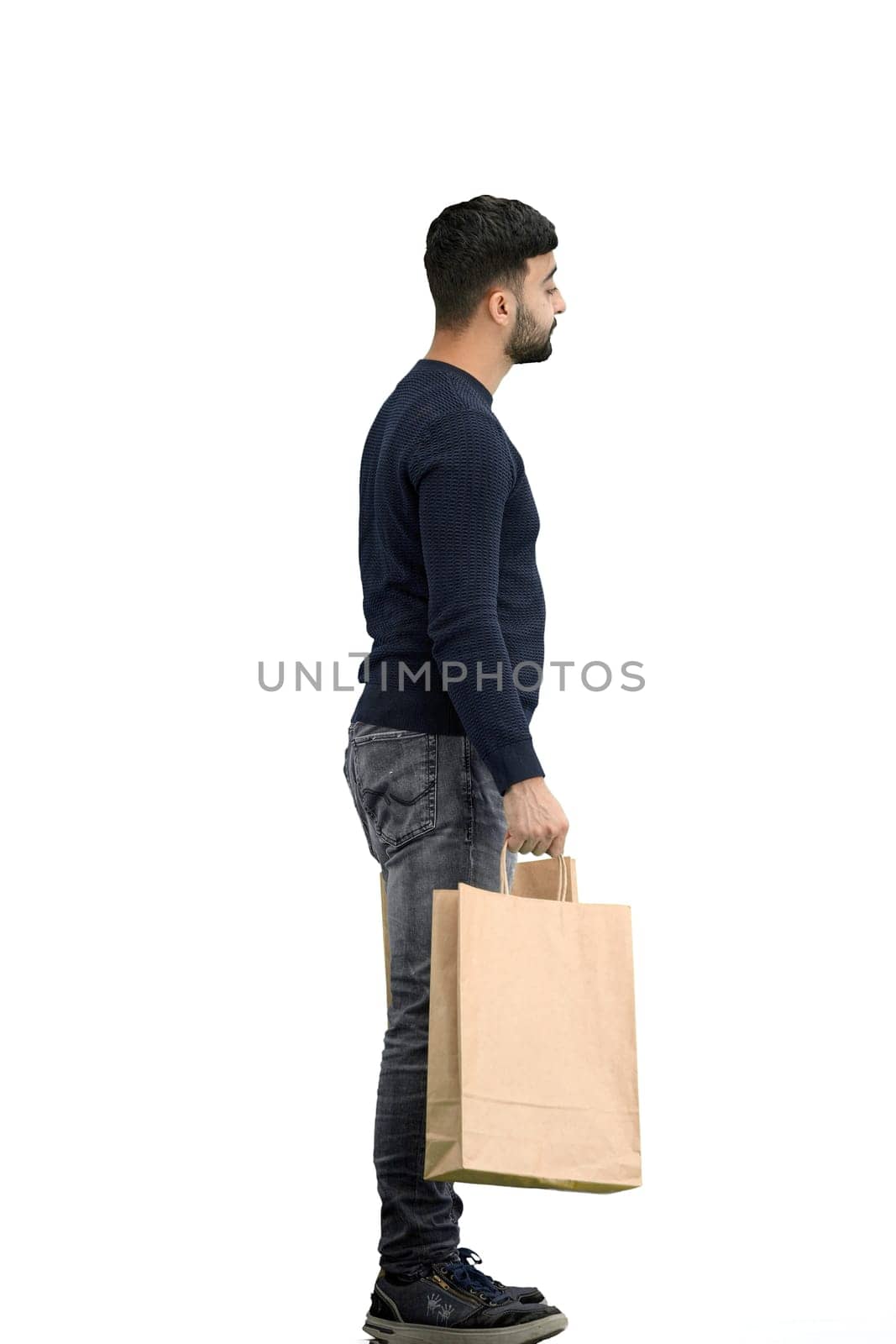 A man, full-length, on a white background, with bags.