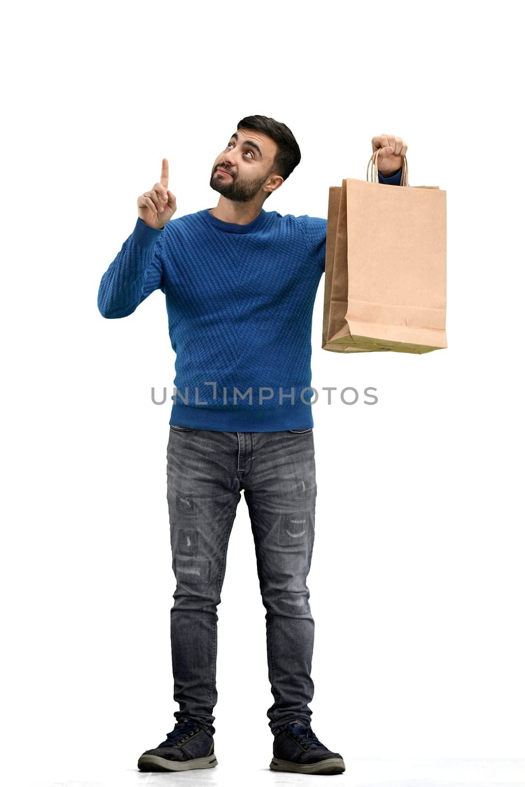 A man, full-length, on a white background, with bags.