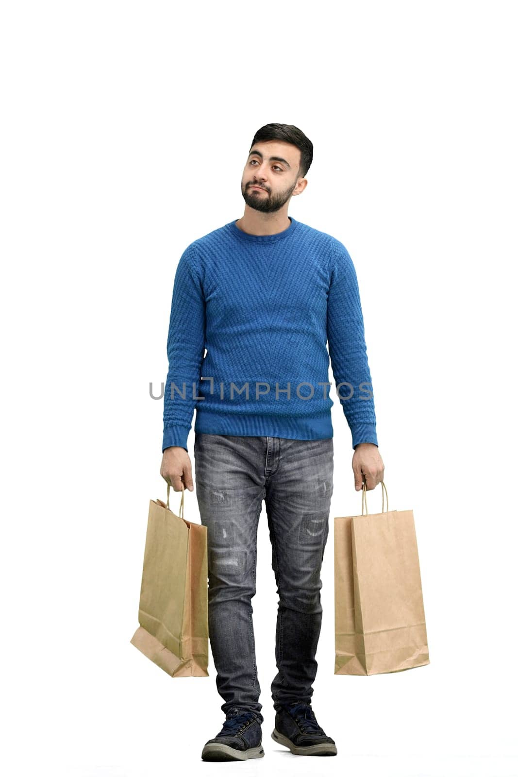 A man, full-length, on a white background, with bags.