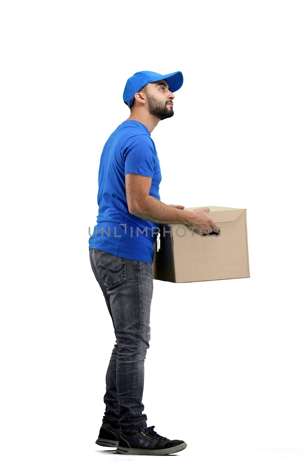 The deliveryman, in full height, on a white background.