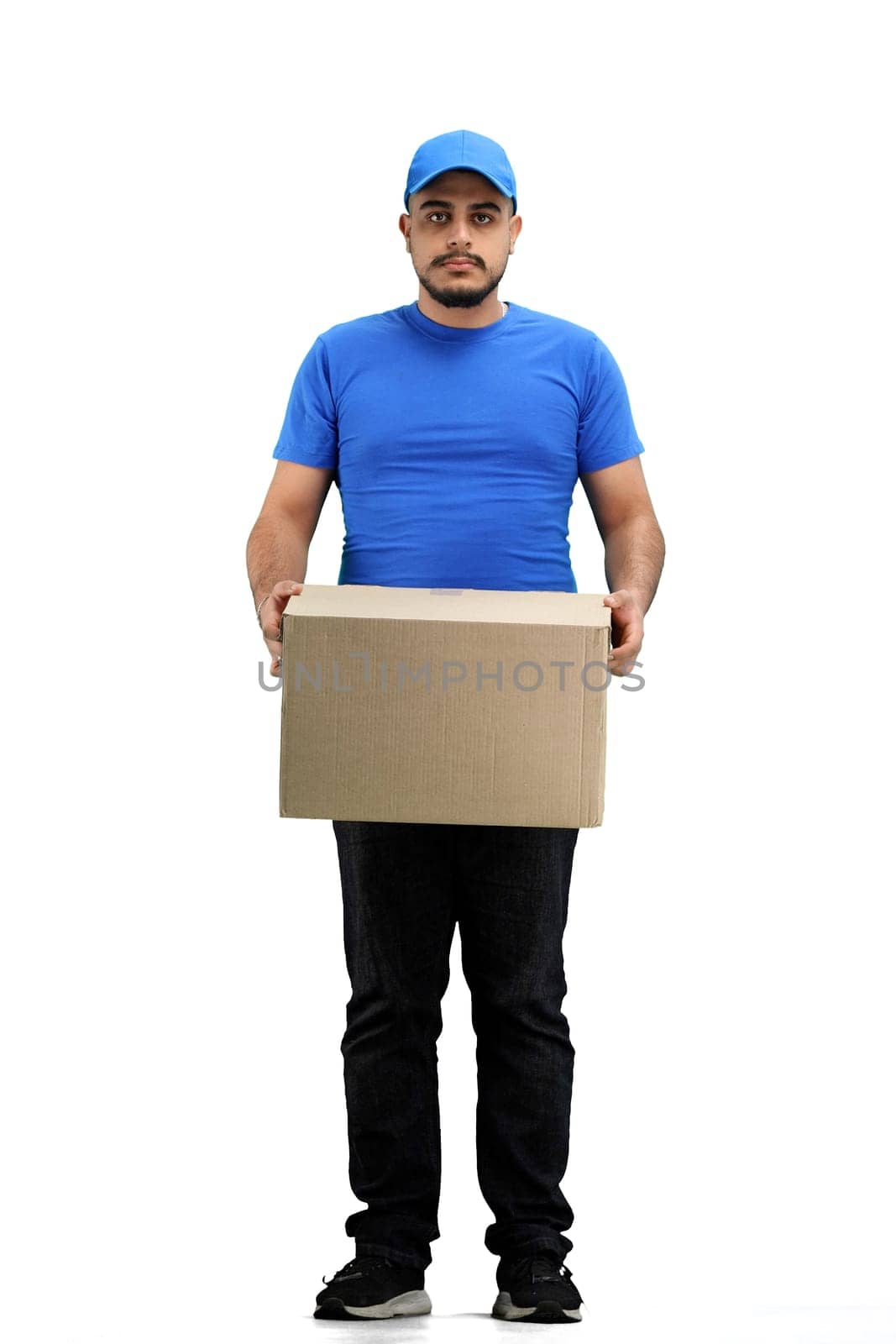 The deliveryman, in full height, on a white background.