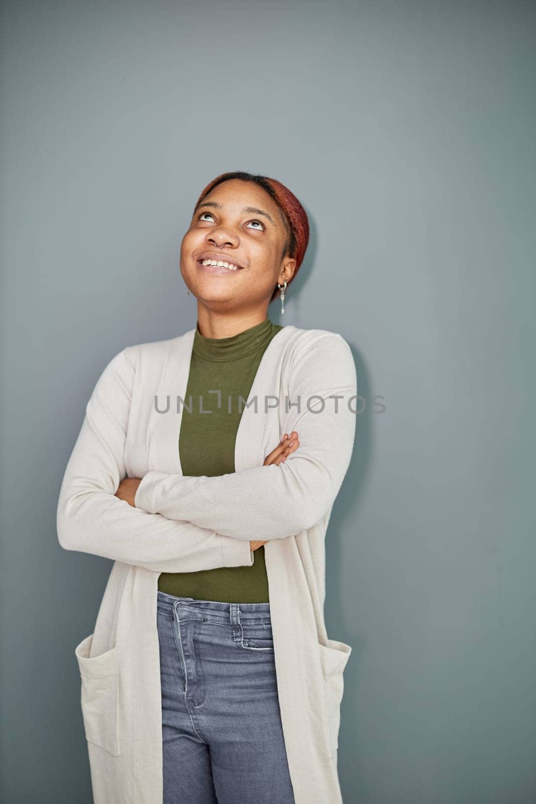 Close-up photo of a pretty, pensive dark-skinned girl, student, manager, secretary, freelancer