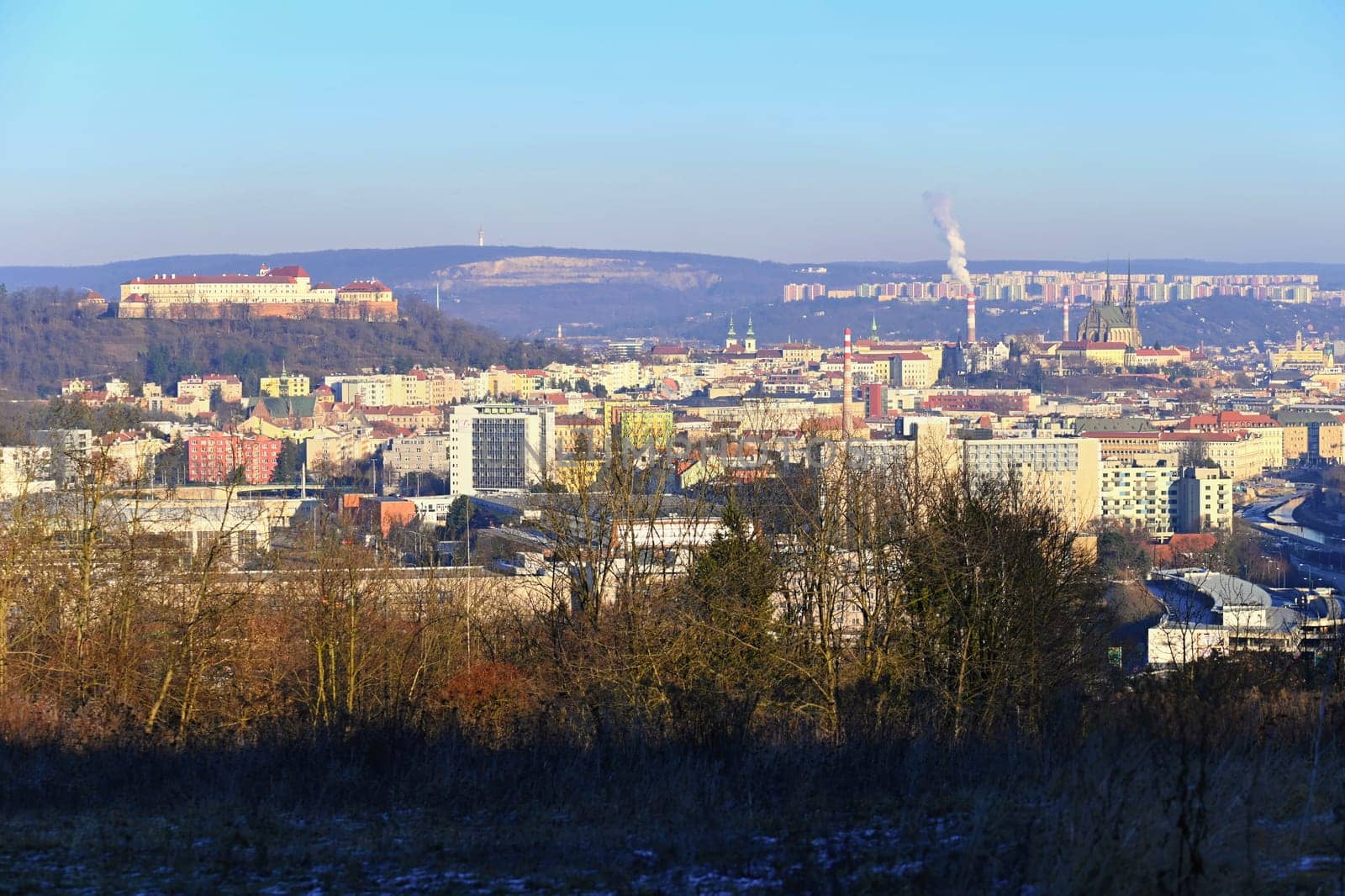 Brno city in the Czech Republic. Europe. Petrov - Cathedral of Saints Peter and Paul and Spilberk castle. Beautiful old architecture and a popular tourist destination. Photography of the city landscape in sunset.  by Montypeter