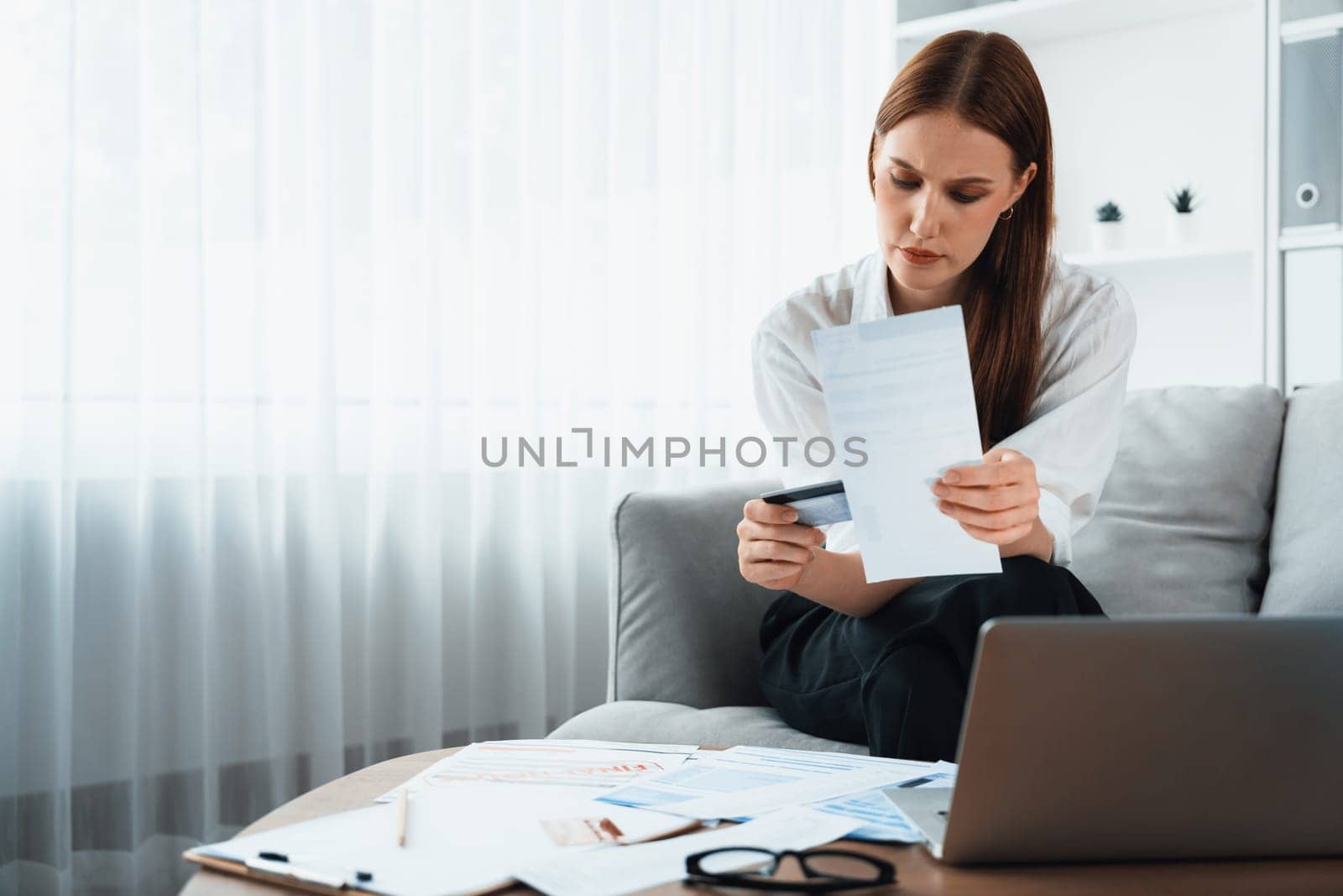 Stressed young woman has financial problems with credit card debt to pay utmost show concept of bad personal money and mortgage pay management crisis.