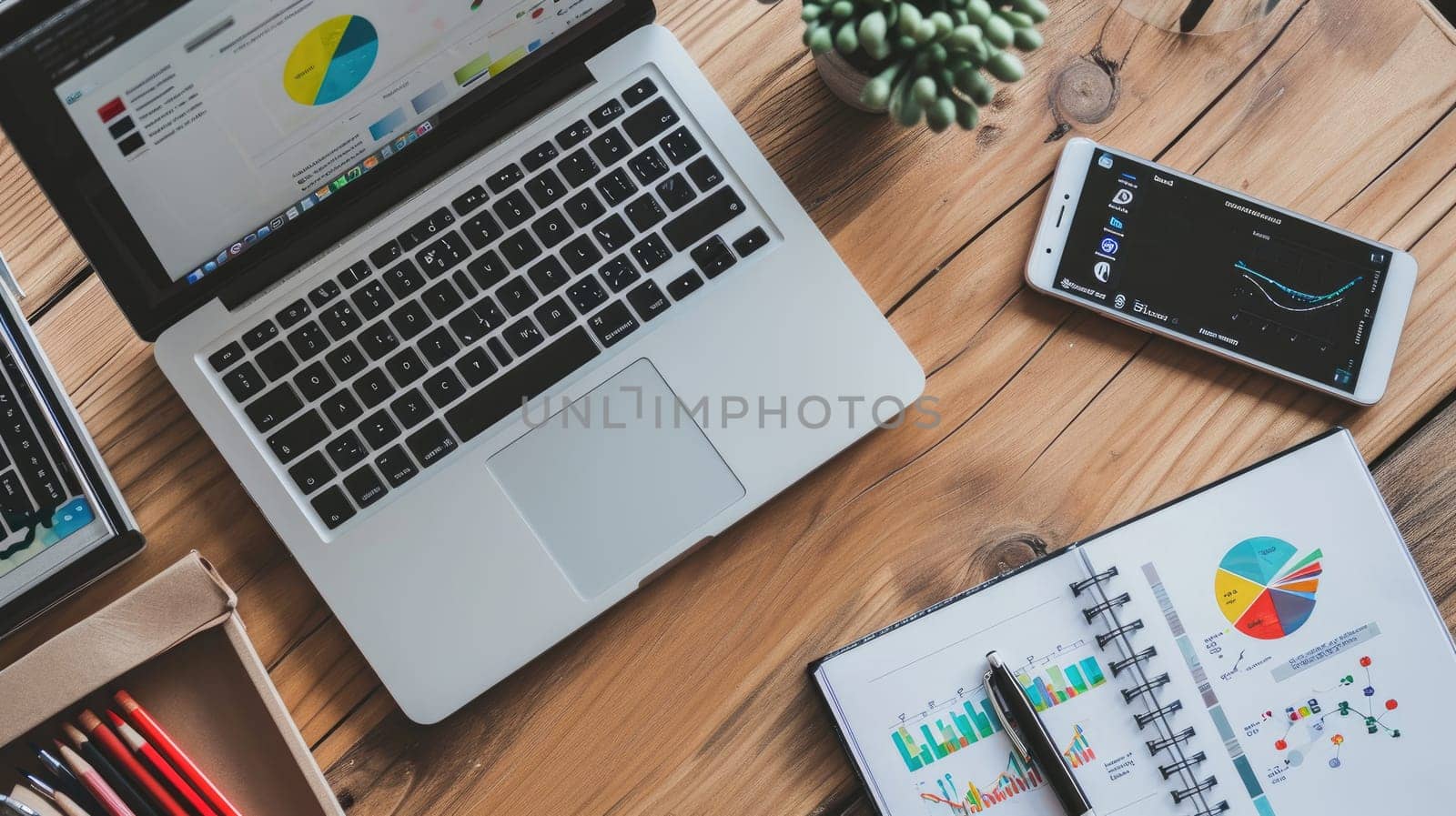 A modern work space desk with a laptop, working desk with accessory.
