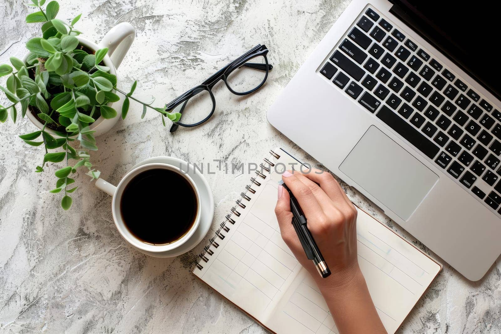 Flat lay of woman hand writing 2024 to do list on notebook, 2024 planning concept.