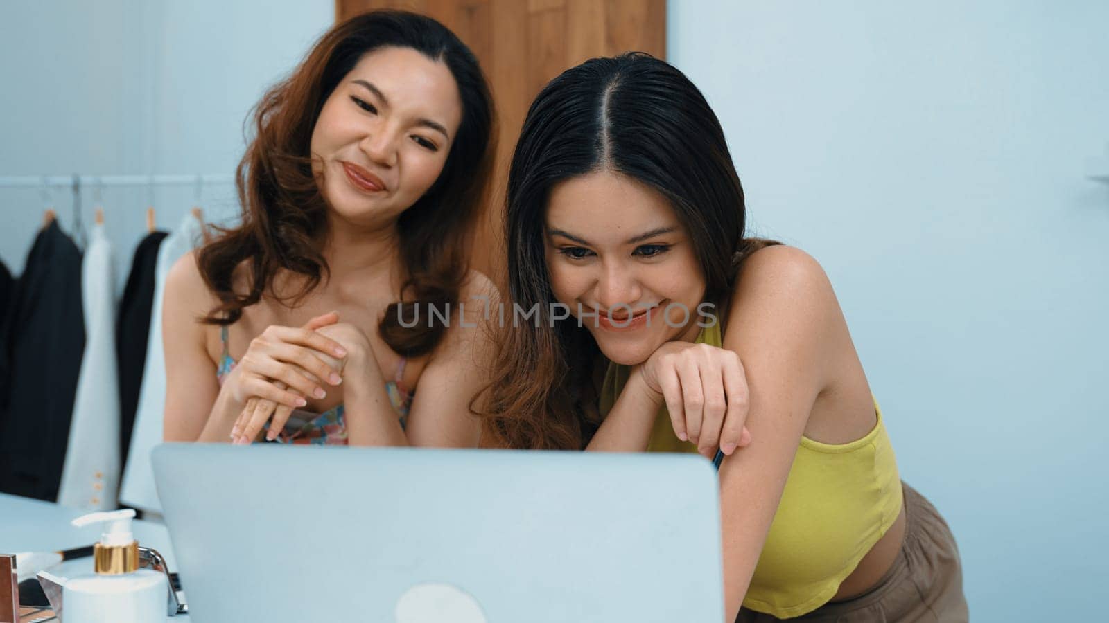 Two influencer partner shoot live streaming vlog video review makeup social media or blog. Happy young girl with vivancy cosmetics studio lighting for marketing recording session broadcasting online.