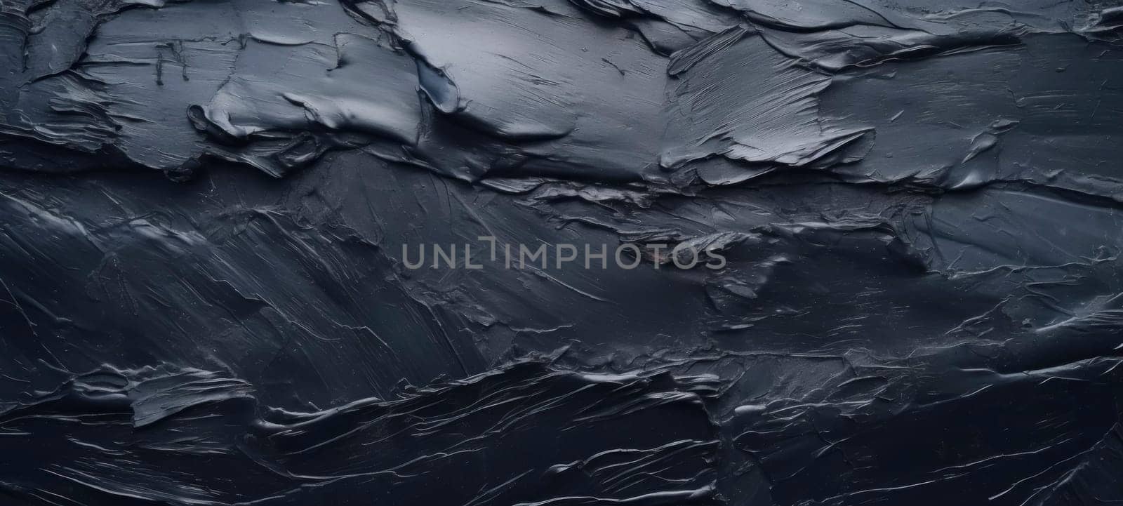 Dark slate texture with rough, uneven surface and layers.