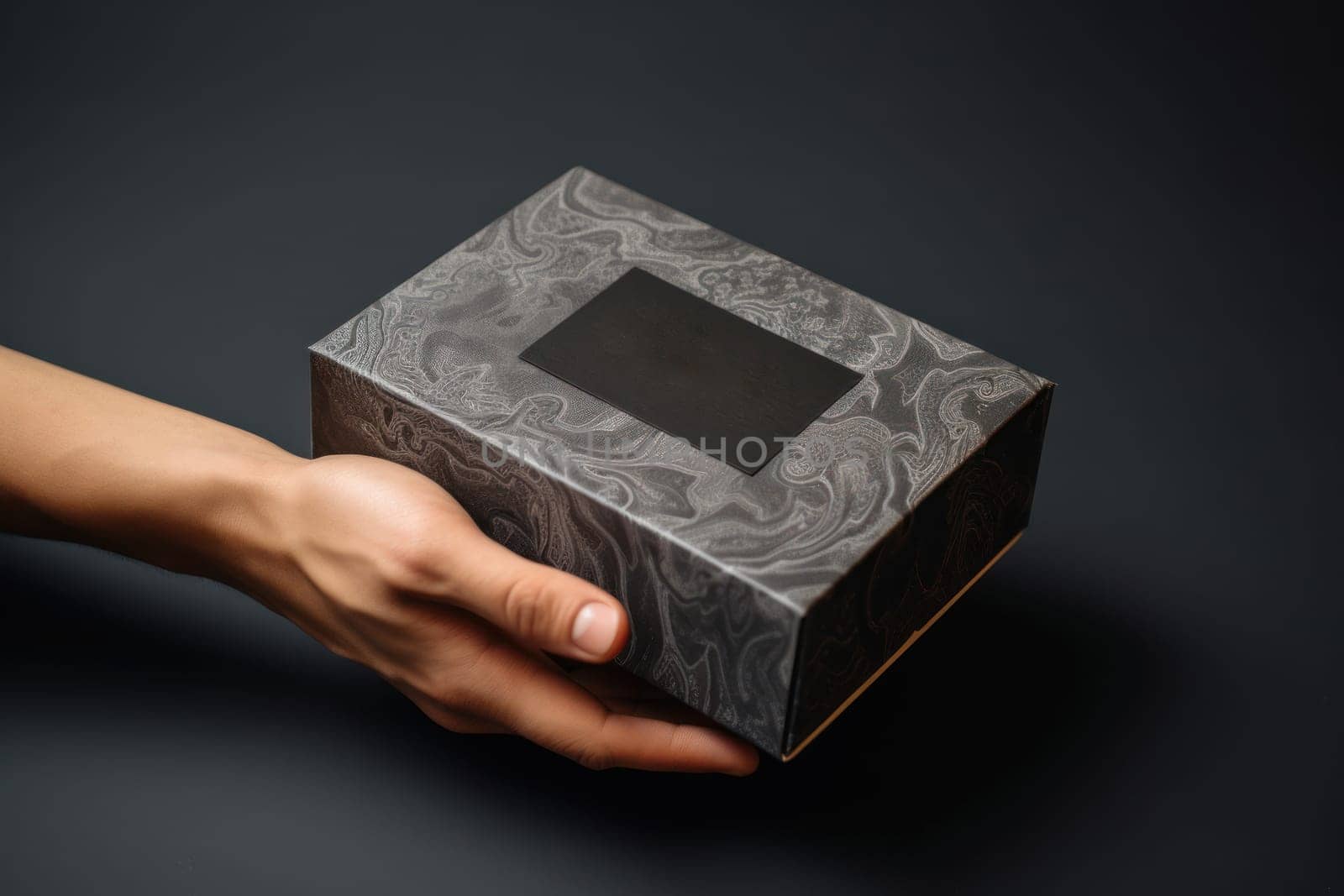 a hand holding a mailing box mockup delivery service concept photo.