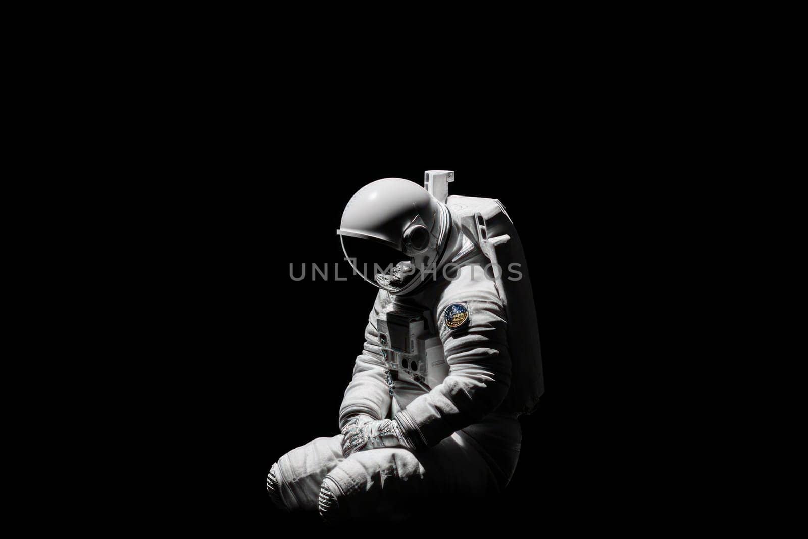 Photo of an astronaut in the black darkness Generative AI.