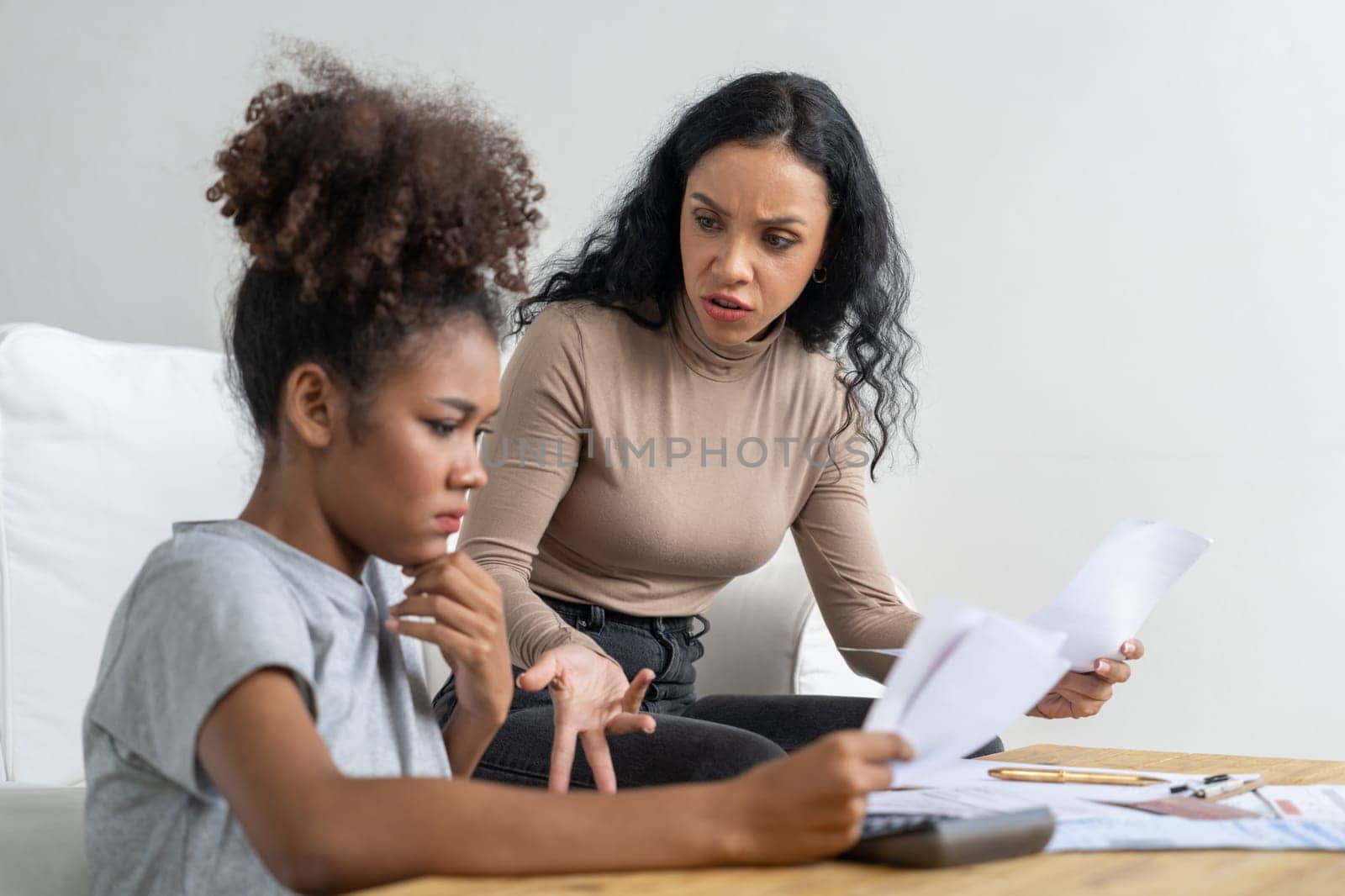 Stressed African American women has financial problems with credit card debt to pay crucial show concept of bad personal money and mortgage pay management crisis.