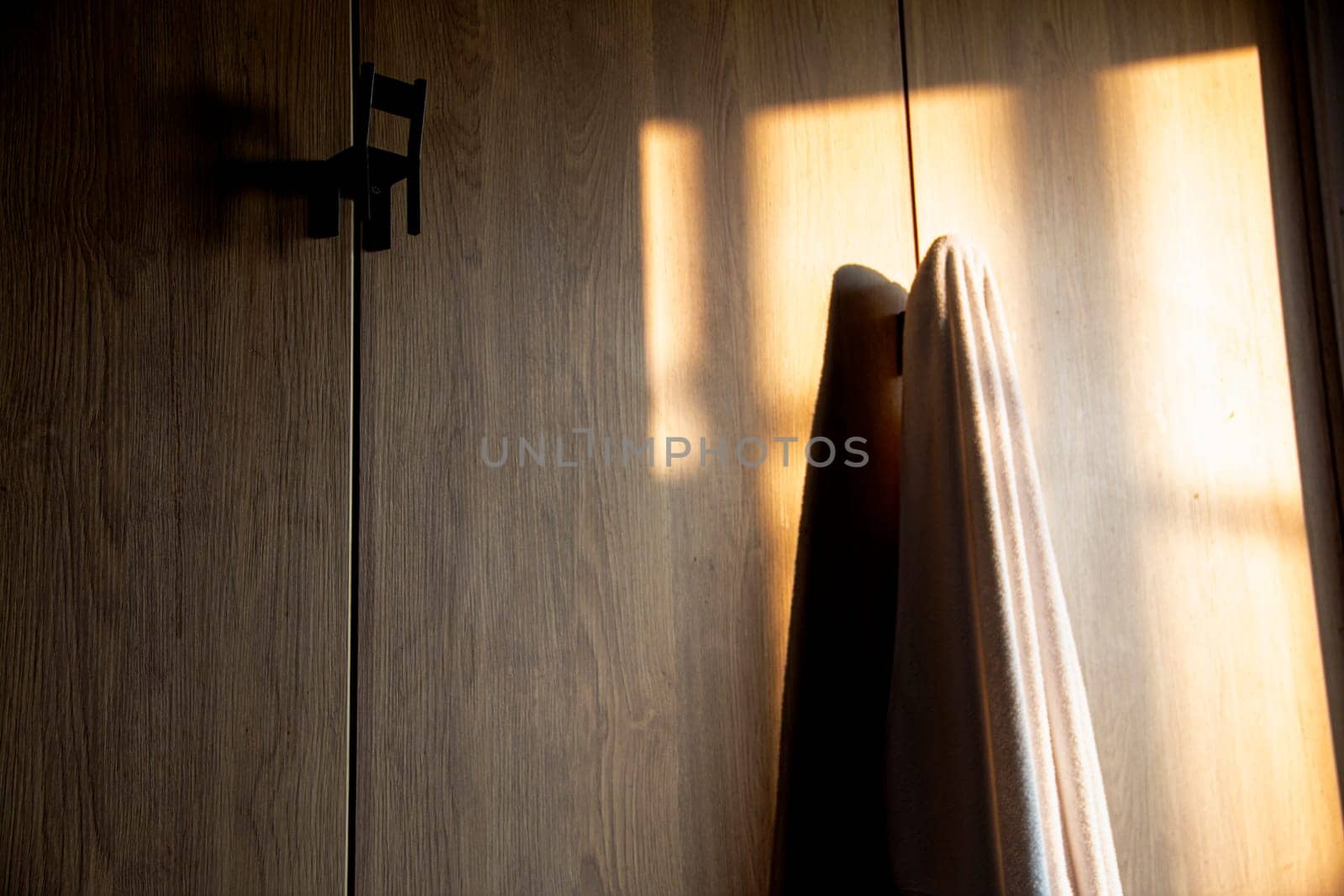 Towel As Hanging In Front Of The Closet by urzine