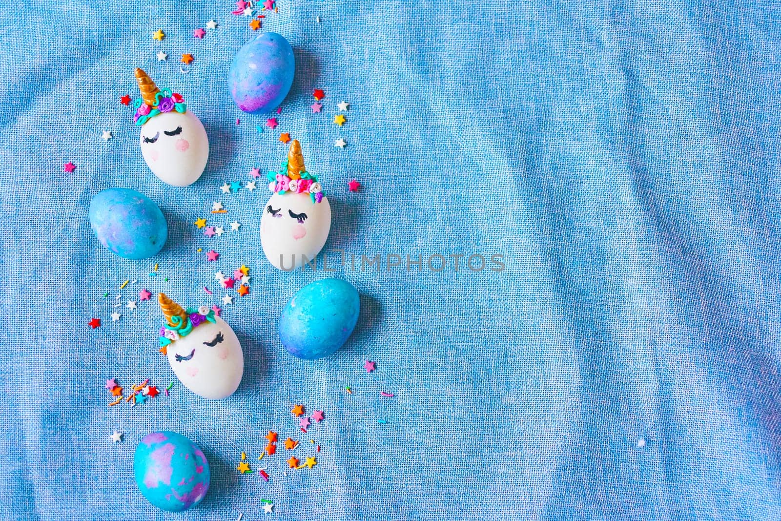Easter eggs unicorns with painted closed eyes