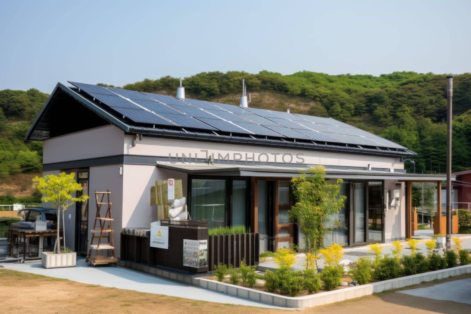 Photograph of a house with solar panel on the roof.