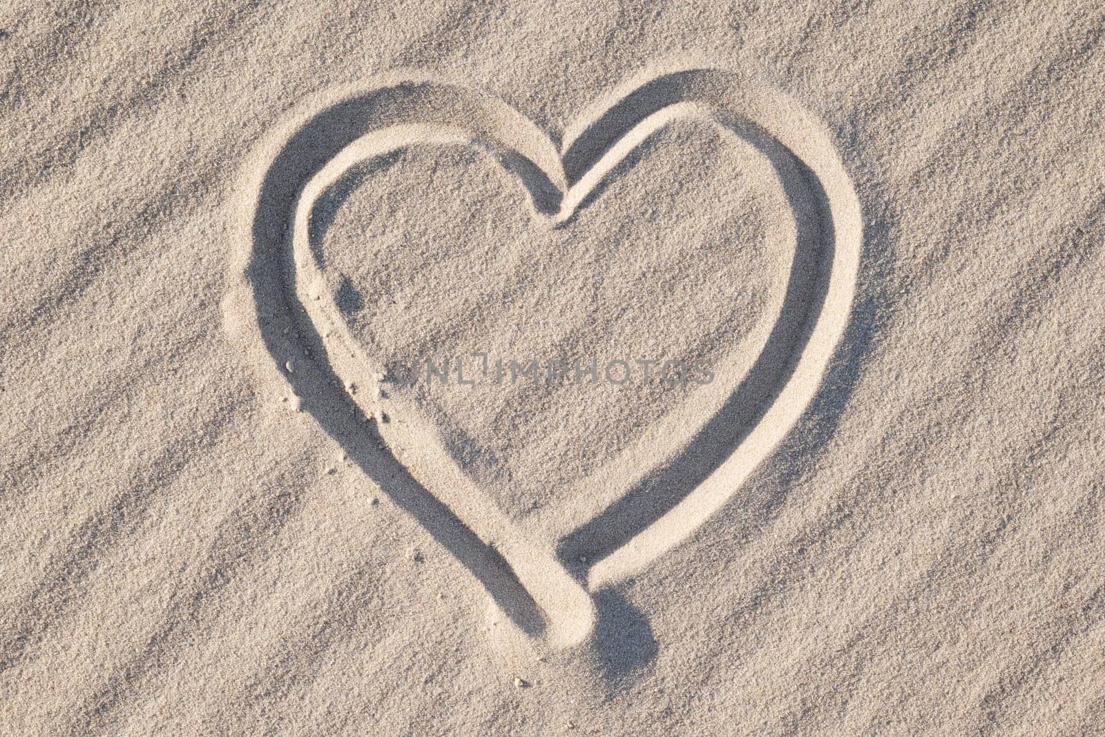 Heart shape in sand by VitaliiPetrushenko