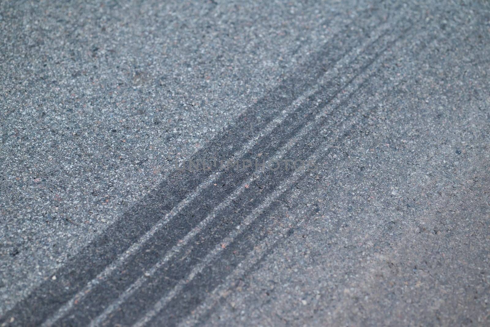Braking trace on asphalt road by VitaliiPetrushenko