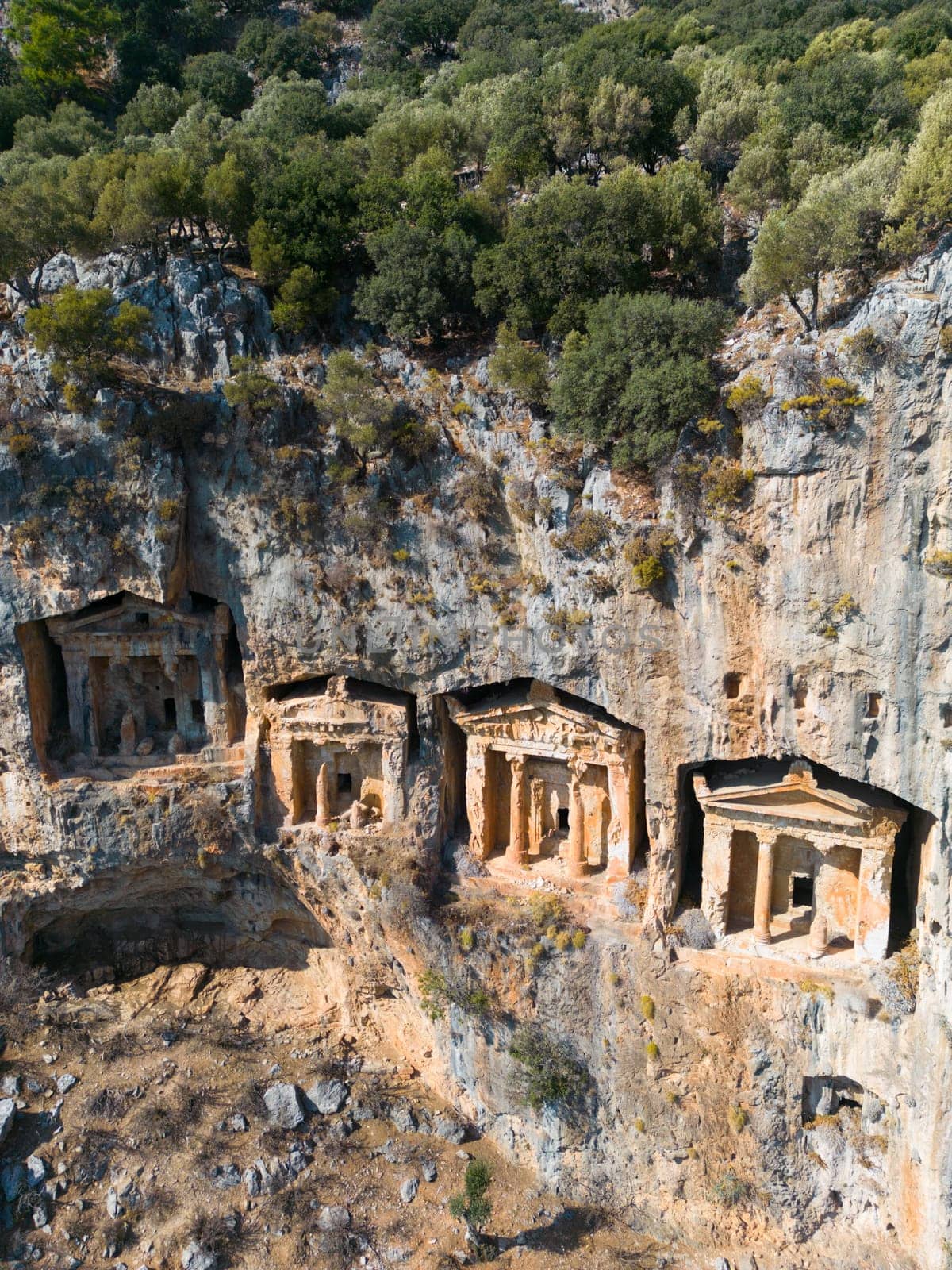 Dalyan, Mugla. Turkey Kings tombs in the cliff face Kaunos Dalyan, Turkey. Aerial view . by senkaya