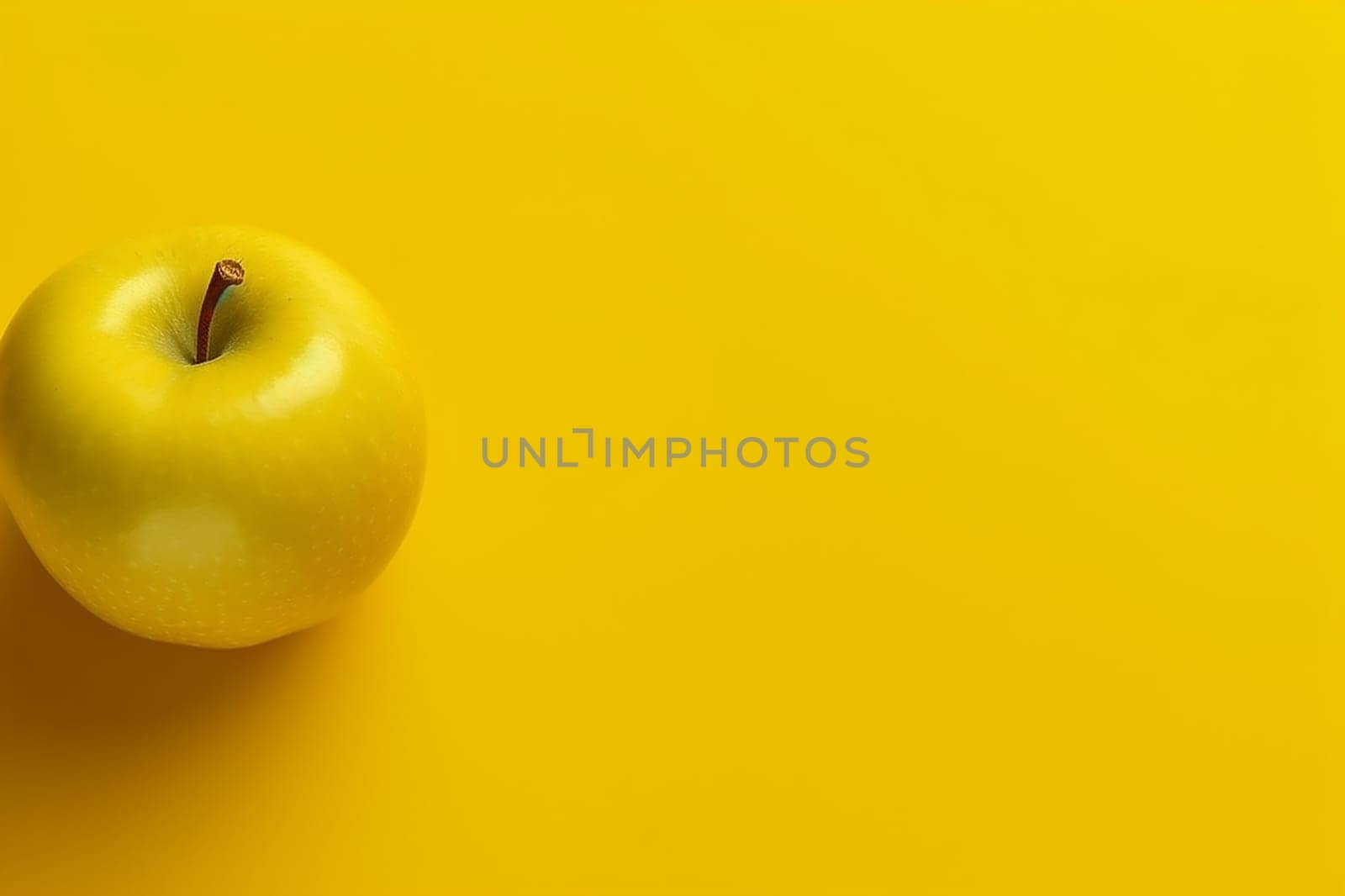 Green apple on yellow background, top left corner placement