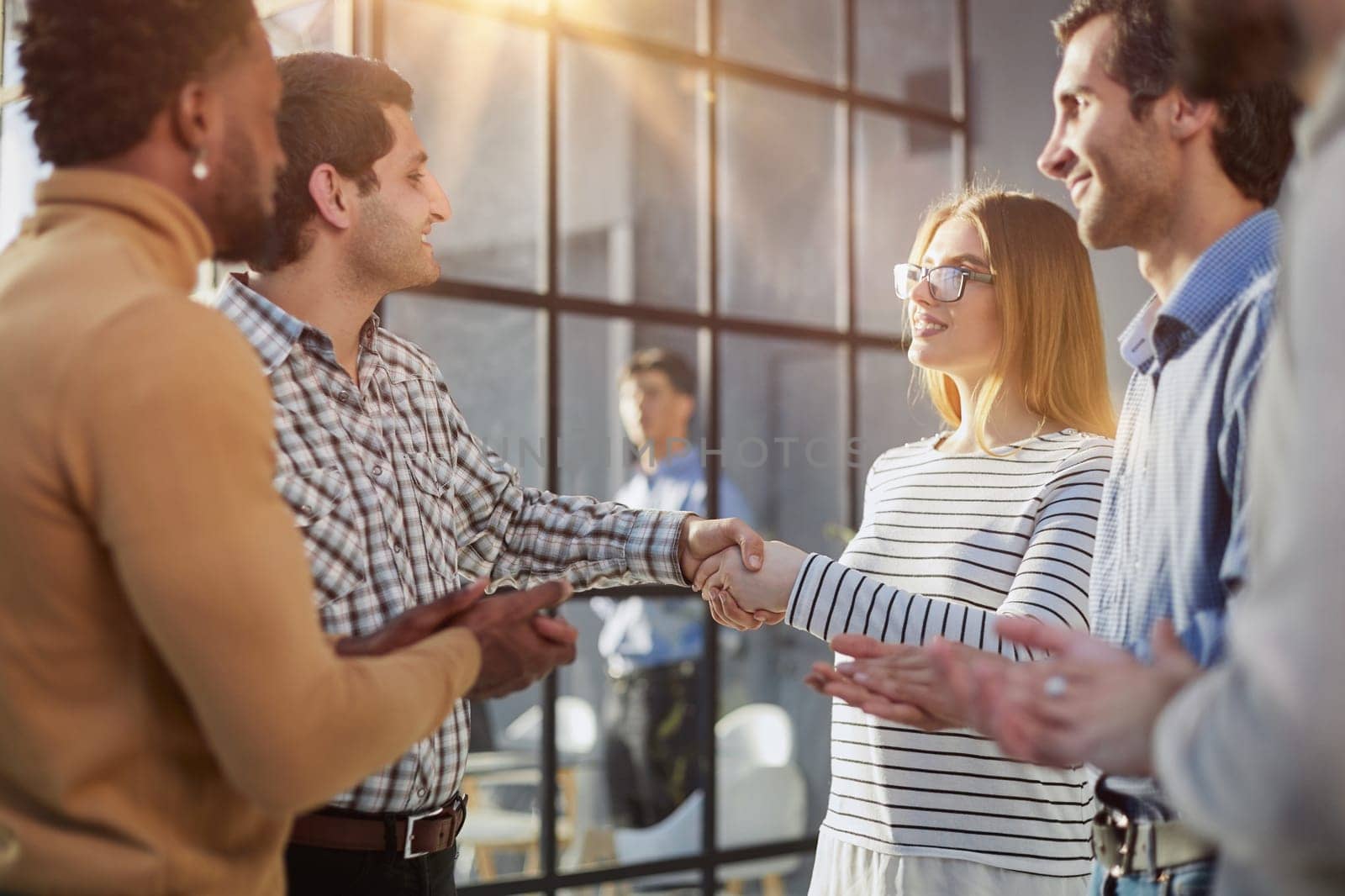 businessman greeting and handshake with business woman in negotiations